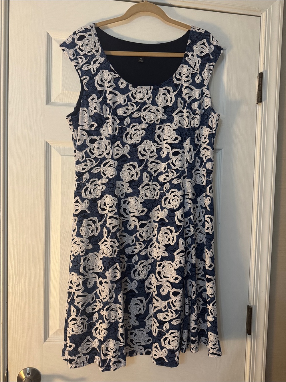 Sleeveless Navy Blue Floral Lace A-Line Dress by Ronni Nicole